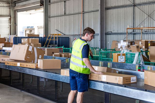 Depot team sorting freight