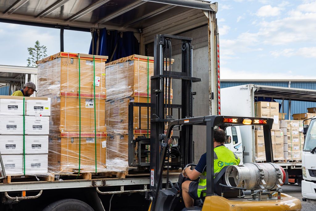 Pallet freight loaded by forklift at the Yandina depot