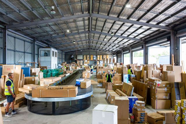 Large and oversize freight being sorted inside the Yandina depot